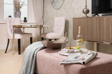 a table with a basket and chairs