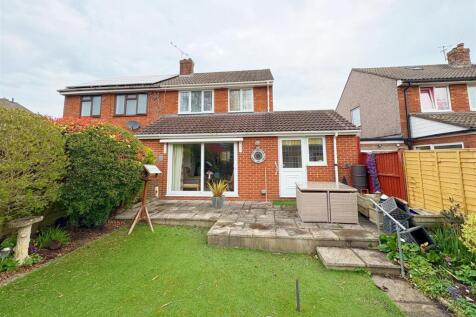 Rear view of property and patio.jpg