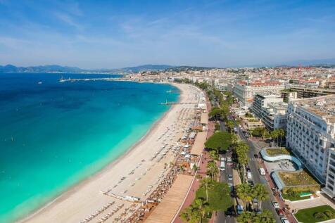 Panorama of Cannes, Cote d'Azur, France, South Europe. Nice city and luxury resort of French riviera. Famous tourist destination with nice beach and Promenade de la Croisette on Mediterranean sea