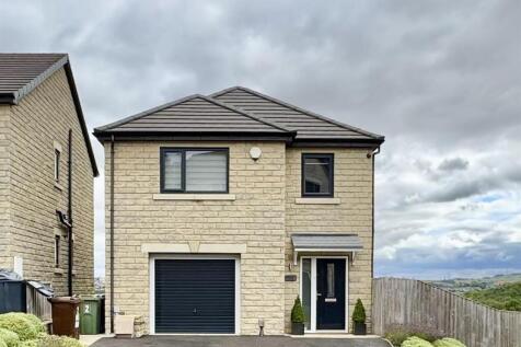 EXTERNAL FRONT, GARAGE AND DRIVEWAY