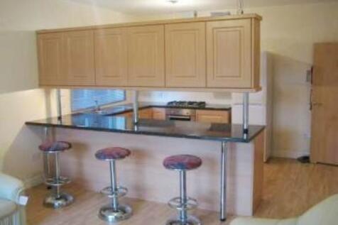 Modern open kitchen with stylish breakfast bar...