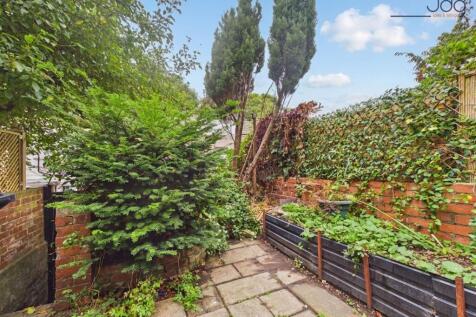 A Private Garden with Raised Terrace