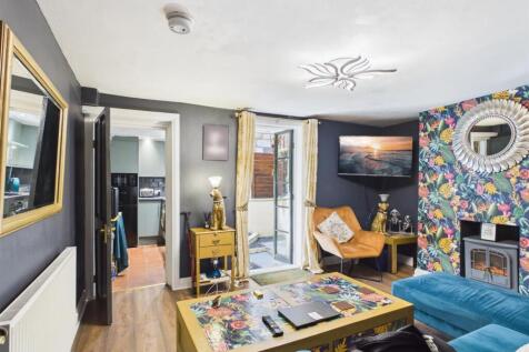 Reception room basement flat
