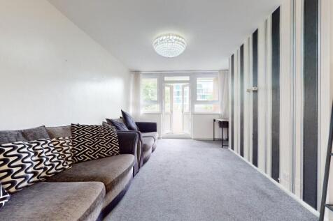 Bright living room with stylish feature wall...