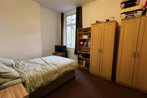 Bright double bedroom with ample storage space...