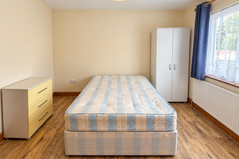 Brightened, Straightened Bedroom Interior.png