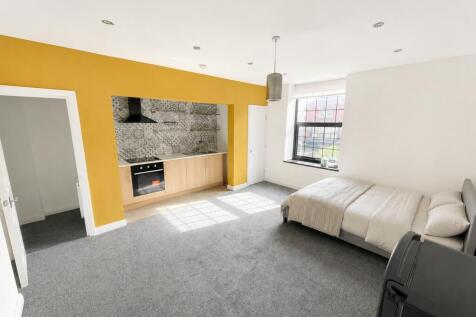 Bright and spacious studio with a modern kitche...