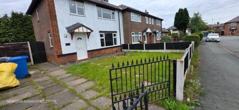 Semi with gated front lawn and driveway...