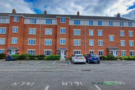 REAR OF BLOCK AND PARKING SPACE