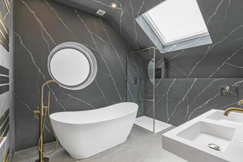 property in Grand Drive, 
Raynes Park, SW20