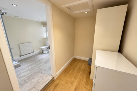 Warm Minimalist Hallway and Bathroom.png