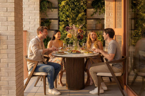 Group sat on balcony outside
