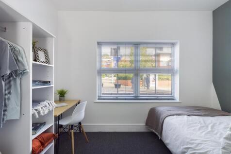Bright, neatly presented single bedroom with a ...