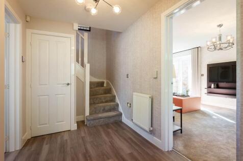 Living spaces on either side of the hallway