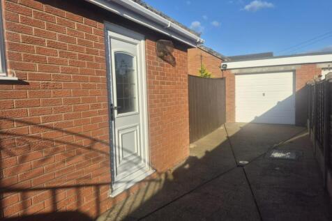 DETACHED BRICK GARAGE