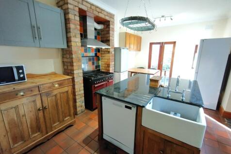 Bright, characterful kitchen with a central isl...