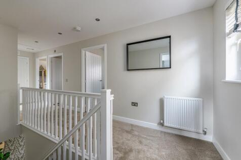 The landing is flooded with natural light