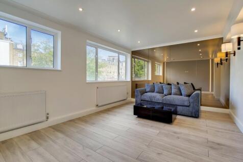 Bright lounge with mirrors and modern flooring...