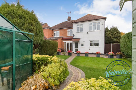 Rear gardens with greenhouse shed and gated side a