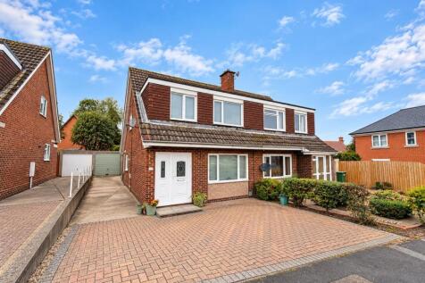 Sunny Semi-Detached Home Exterior.jpg