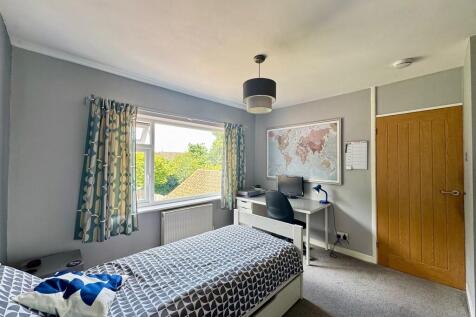 Bedroom with Wind...