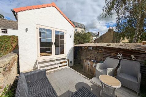 Externally To The Front Of The Annex