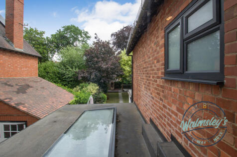 View from middle bedroom towards South facing gard