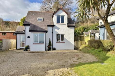Garret Cottage, one bedroom upper lounge and sea v