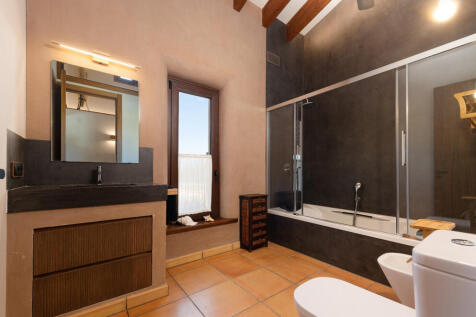 Separate individual bathroom with bathtub