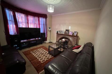 A cozy living room featuring comfortable seatin...