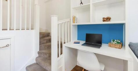 Modern study desk with ample shelving storage....