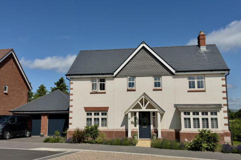 Front with Double Garage and Parking