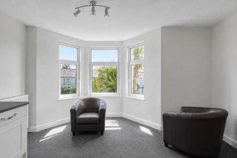 Bright, spacious room with lovely bay windows...