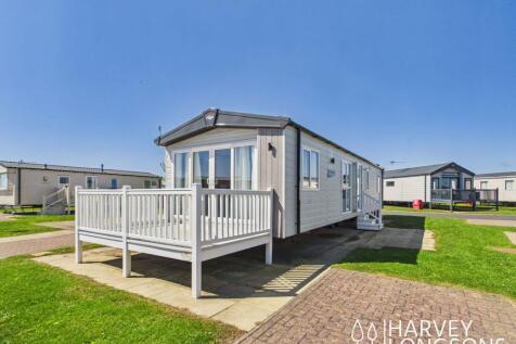 Regal Charmouth holiday home exterior with decking
