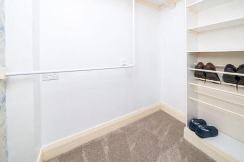 BEDROOM 1 WALK-IN WARDROBE