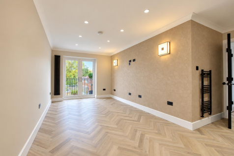Minimalist Beige Room with French Doors.png