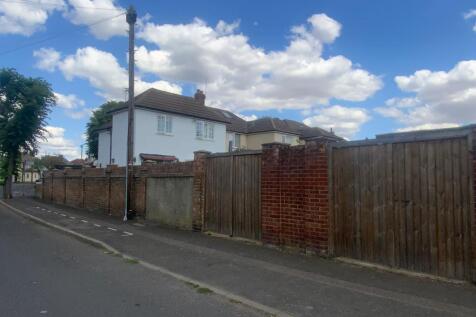 DOUBLE GATES ONTO GARAGE