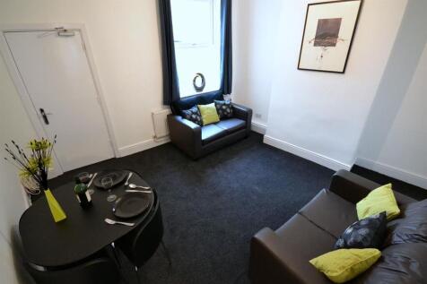 Bright living area with stylish dining space...