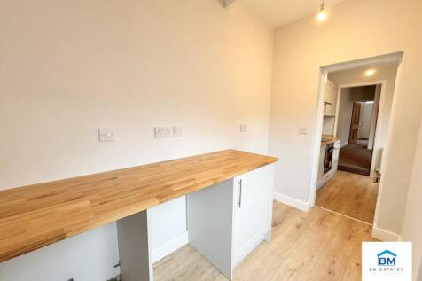 Utility room facing kitchen