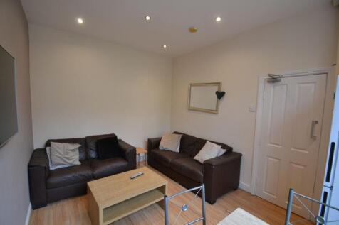 A welcoming contemporary living room featuring ...