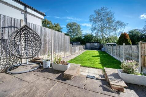 Rear Garden - dining patio and lawn.jpg