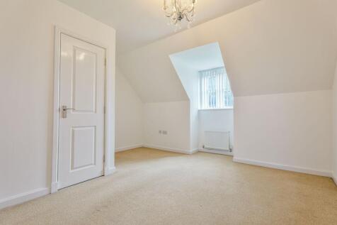 Primary Bedroom with Closet and View to Front of House