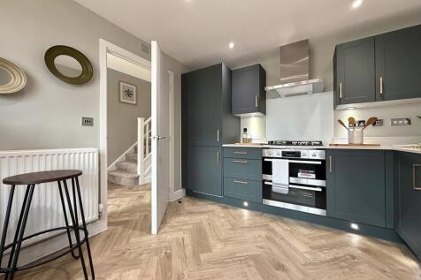 Why not try putting a breakfast area in the corner?