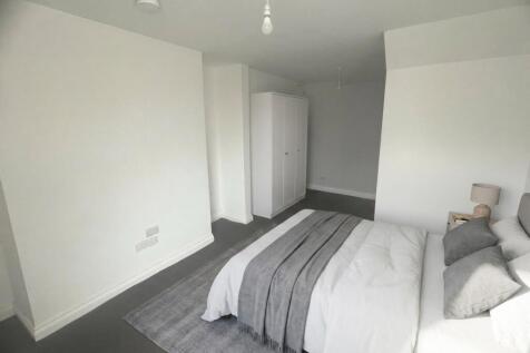 Elegant modern bedroom with fresh white decor...