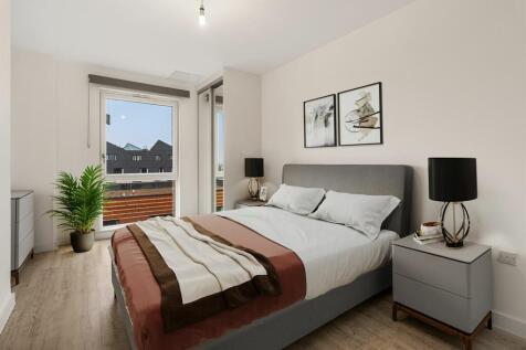 Experience tranquility in this beautifully designed bedroom, featuring modern furnishings and natural light.