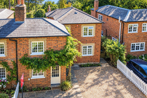 Sunlit English Brick Cottage Complex.png