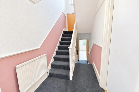 Bright Pastel Stairwell with Charcoal Carpet_separ