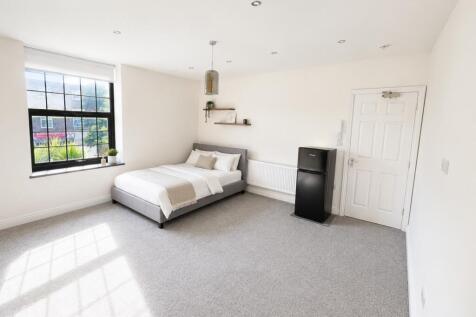 Bright and airy bedroom with modern furnishings...