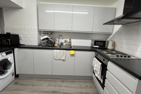 Modern kitchen with sleek gloss cabinetry...