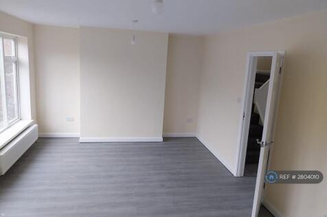Spacious Living Room Leading Out To Kitchen Area